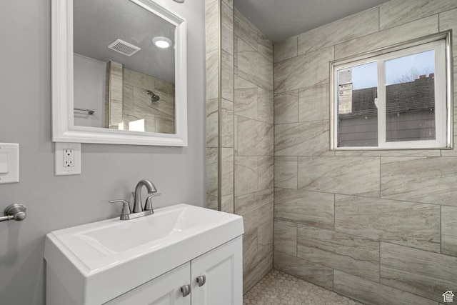 3174 S 9100 W, Magna, UT 84044 - bathroom featuring vanity and tiled shower