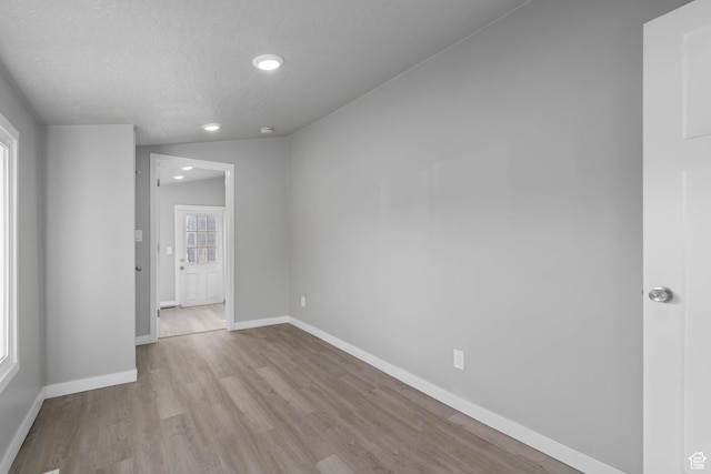3174 S 9100 W, Magna, UT 84044 - unfurnished room featuring wood finished floors, recessed lighting, and a textured ceiling