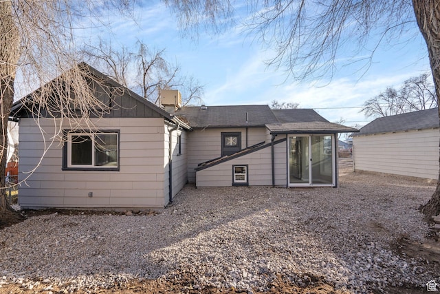 3174 S 9100 W, Magna, UT 84044 - rear view of property with a chimney