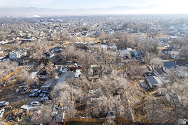 3174 S 9100 W, Magna, UT 84044 - aerial overview of property's location featuring a mountainous background and nearby suburban area