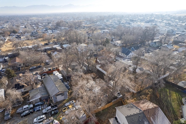 3174 S 9100 W, Magna, UT 84044 - aerial view of property and surrounding area with nearby suburban area and a mountainous background