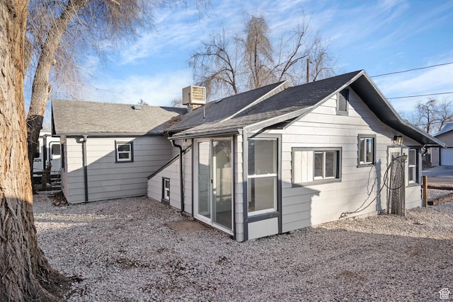 3174 S 9100 W, Magna, UT 84044 - back of property featuring roof with shingles and a chimney