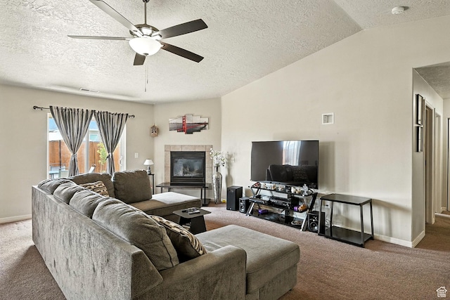 253 N 4300 W, Cedar City, UT 84720 - carpeted living area with a ceiling fan, a textured ceiling, vaulted ceiling, and a tiled fireplace