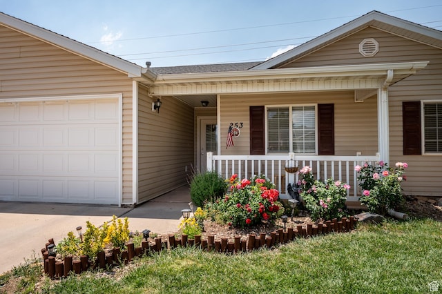 253 N 4300 W, Cedar City, UT 84720 - view of front of property featuring covered porch, a garage, driveway, and roof with shingles