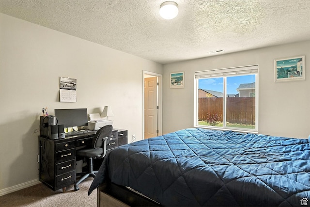 253 N 4300 W, Cedar City, UT 84720 - carpeted bedroom featuring a textured ceiling and an office area