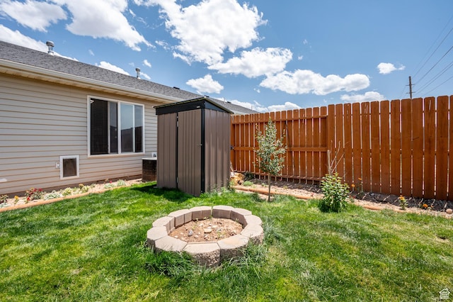 253 N 4300 W, Cedar City, UT 84720 - fenced backyard with a storage shed and an outdoor fire pit