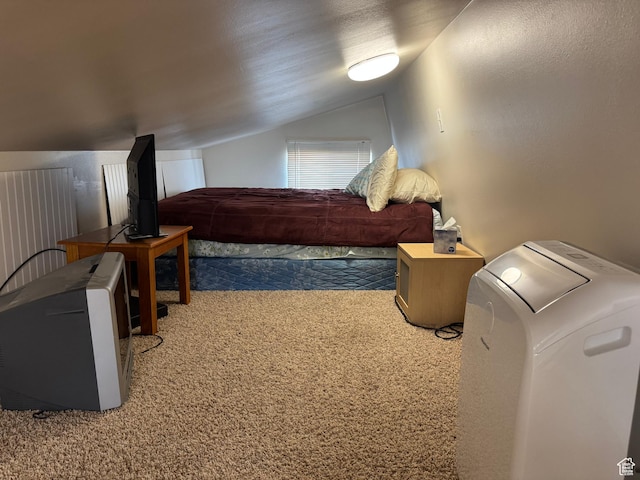 1225 N Dixie Downs Rd Unit 103, St George, UT 84770 - carpeted bedroom with vaulted ceiling and washer / clothes dryer