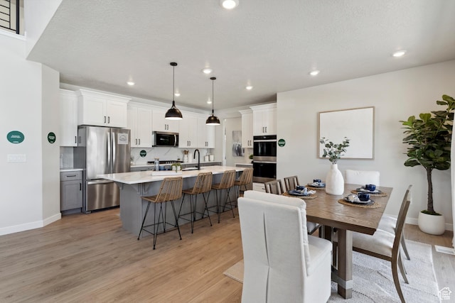 181 N Husker Ln Unit 14, Saratoga Springs, UT 84045 - dining room featuring light wood finished floors and recessed lighting