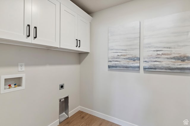 181 N Husker Ln Unit 14, Saratoga Springs, UT 84045 - laundry room with cabinet space, hookup for an electric dryer, light wood-style floors, and hookup for a washing machine