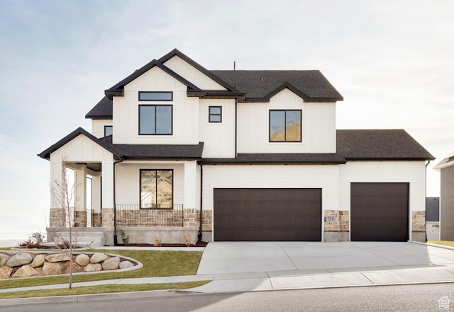 719 W Horizon Dr Unit 134, Lehi, UT 84048 - modern inspired farmhouse with stone siding, board and batten siding, an attached garage, and driveway