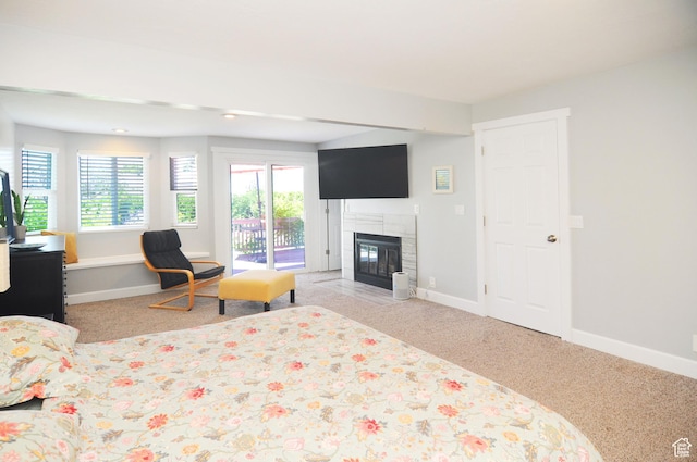 2845 Banbury Rd E, Cottonwood Heights, UT 84121 - carpeted bedroom with access to outside, a tile fireplace, and recessed lighting