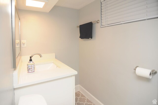 2845 Banbury Rd E, Cottonwood Heights, UT 84121 - bathroom with vanity and baseboards