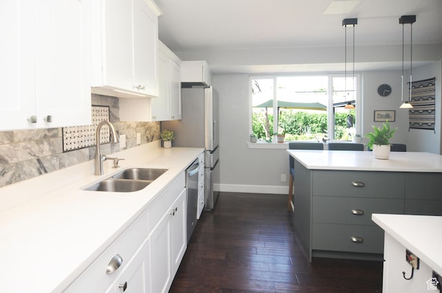 2845 Banbury Rd E, Cottonwood Heights, UT 84121 - kitchen with dishwasher, white cabinets, light countertops, and tasteful backsplash