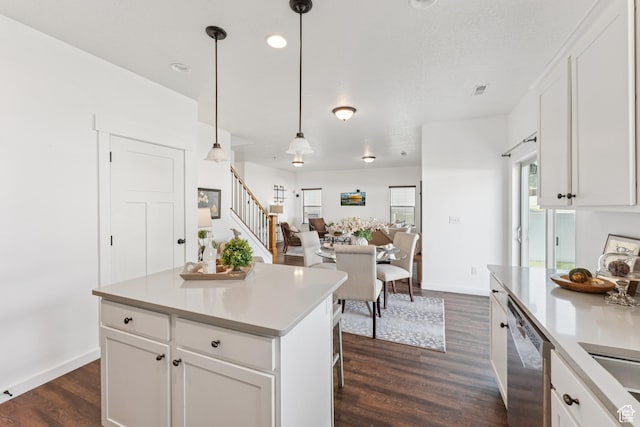 13316 S Moseley Way, Herriman, UT 84096 - kitchen with dishwasher, dark wood-style floors, light countertops, and white cabinetry