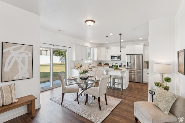 13316 S Moseley Way, Herriman, UT 84096 - dining room with dark wood-style flooring and recessed lighting