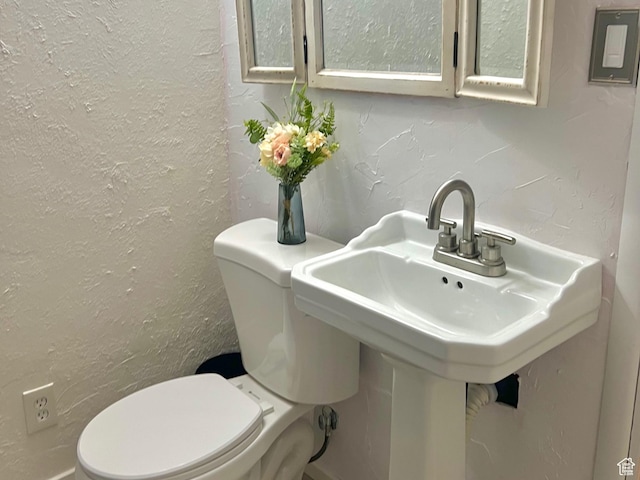 22 W 200 S, Tooele, UT 84074 - bathroom view of toilet and a textured wall