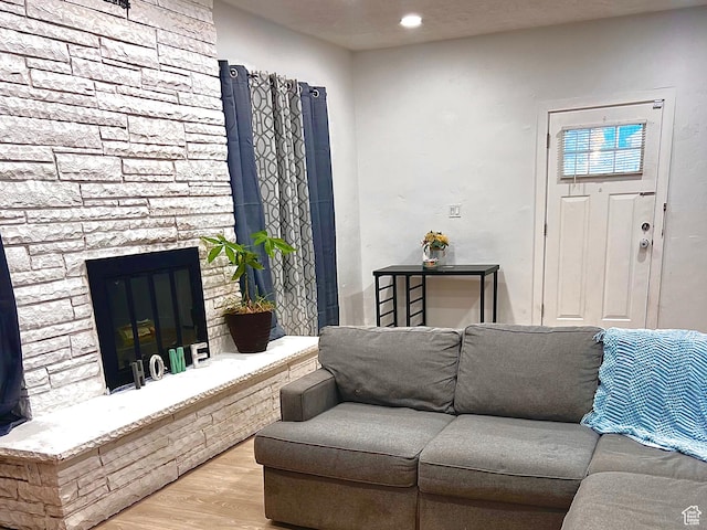 22 W 200 S, Tooele, UT 84074 - living area with wood finished floors and a fireplace