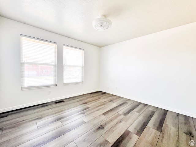 2072 W 5075 S, Roy, UT 84067 - empty room with wood finished floors