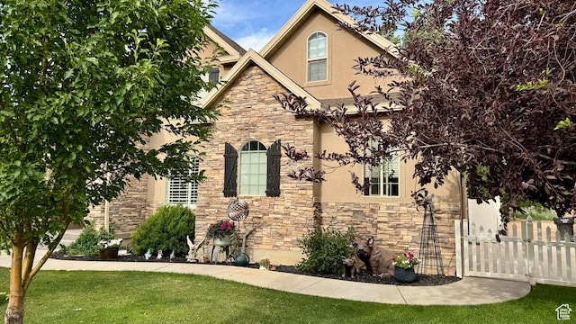 23 S 2200 W, Roosevelt, UT 84066 - view of front of home featuring stone siding and stucco siding