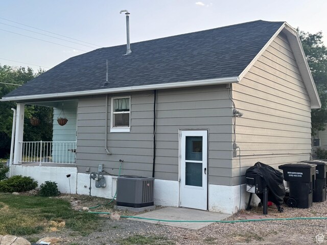 414 W Center St, Fountain Green, UT 84632 - rear view of house with a shingled roof