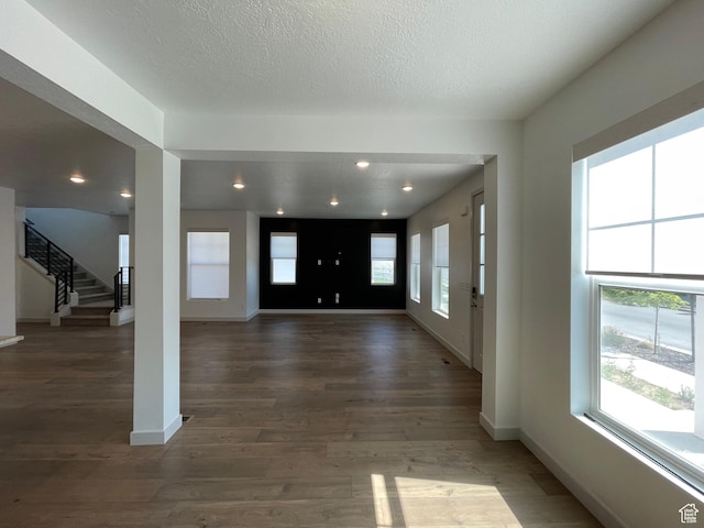 11766 S Watercourse Rd, South Jordan, UT 84009 - entrance foyer featuring stairway, wood finished floors, a textured ceiling, and recessed lighting