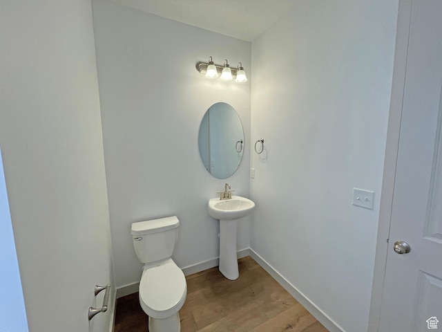 11766 S Watercourse Rd, South Jordan, UT 84009 - bathroom featuring wood finished floors and toilet