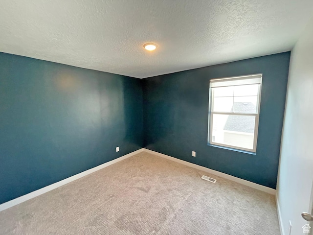 11766 S Watercourse Rd, South Jordan, UT 84009 - carpeted spare room with a textured ceiling