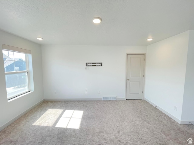 11766 S Watercourse Rd, South Jordan, UT 84009 - carpeted spare room featuring recessed lighting and a textured ceiling