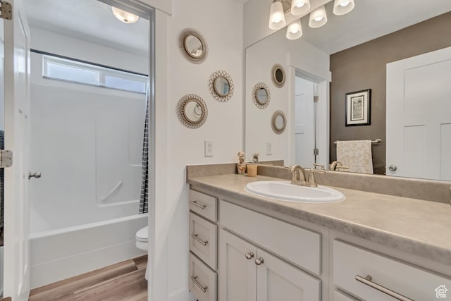 1934 E Sunnyvale Dr, Eagle Mountain, UT 84005 - full bath with vanity, wood finished floors, and tub / shower combination