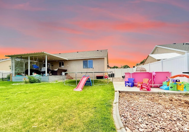 301 S 1350 W, Vernal, UT 84078 - back of house featuring a fenced backyard, a patio area, and stucco siding