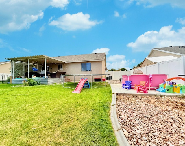 301 S 1350 W, Vernal, UT 84078 - back of property featuring a fenced backyard, stucco siding, and a patio area