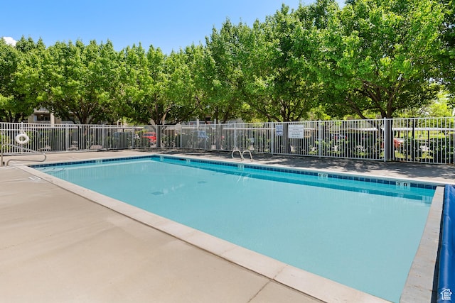 3760 S Carlisle Park Pl W Unit 3, Salt Lake City, UT 84119 - community pool featuring a patio