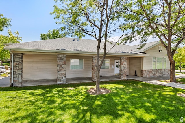3760 S Carlisle Park Pl W Unit 3, Salt Lake City, UT 84119 - view of front of home featuring stone siding, a front lawn, a shingled roof, and a porch