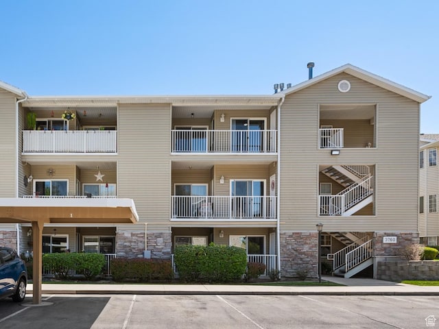3760 S Carlisle Park Pl W Unit 3, Salt Lake City, UT 84119 - view of apartment building / complex with uncovered parking