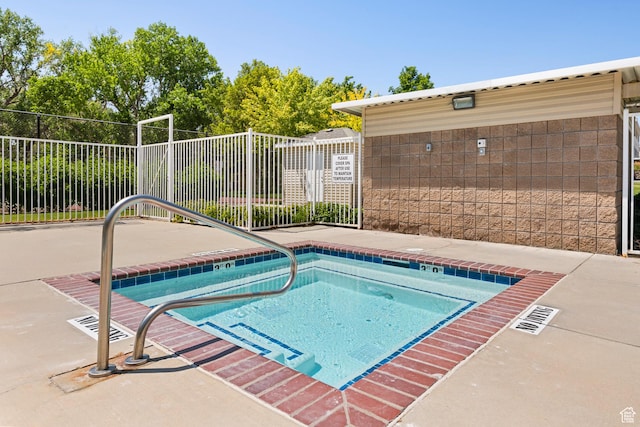 3760 S Carlisle Park Pl W Unit 3, Salt Lake City, UT 84119 - view of pool featuring a hot tub and a pool