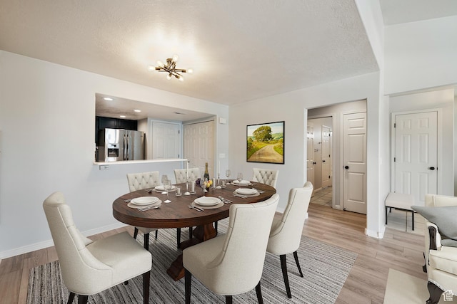 3760 S Carlisle Park Pl W Unit 3, Salt Lake City, UT 84119 - dining room with light wood-style flooring