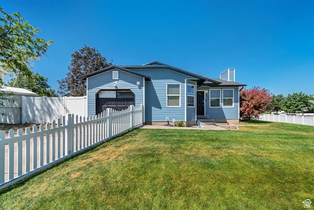 3822 S Chatterleigh Rd W, West Valley City, UT 84128 - view of front facade featuring an attached garage, a fenced backyard, and entry steps