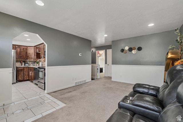 3822 S Chatterleigh Rd W, West Valley City, UT 84128 - living area featuring recessed lighting and light tile patterned floors