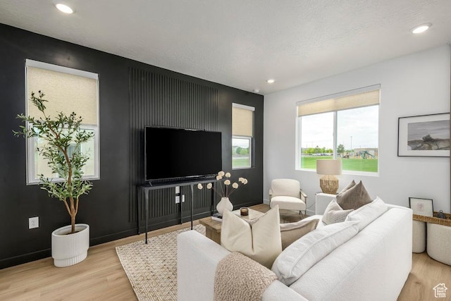 6031 W Highlandbrook Dr, West Jordan, UT 84081 - living area with wood finished floors and recessed lighting