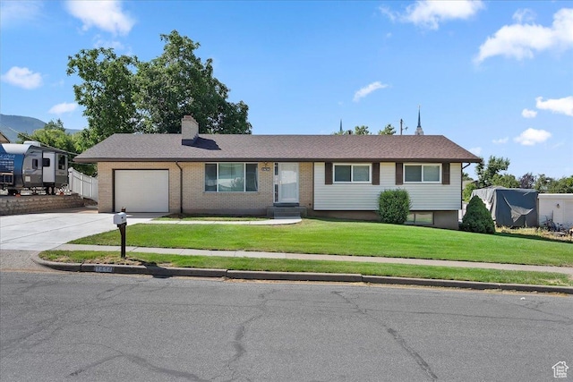 1414 E 275 N, Layton, UT 84040 - ranch-style house featuring concrete driveway, a garage, a chimney, and brick siding