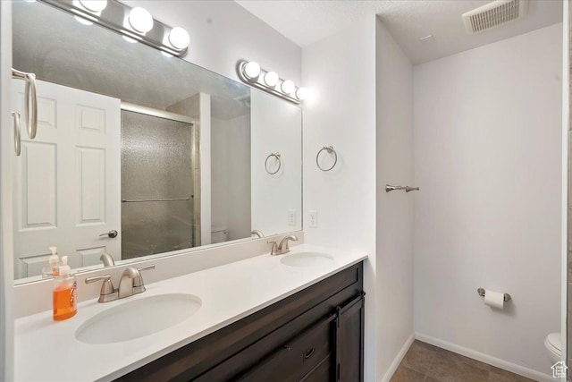 1414 E 275 N, Layton, UT 84040 - full bath featuring double vanity, a shower stall, and tile patterned floors