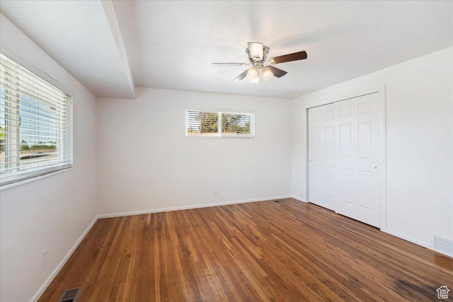 1414 E 275 N, Layton, UT 84040 - unfurnished bedroom with wood finished floors, a closet, and a ceiling fan