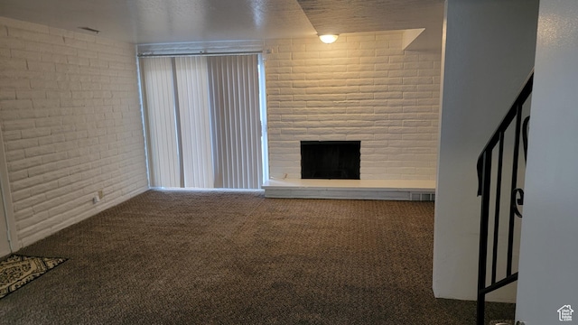 4531 S 700th St E, Murray, UT 84107 - unfurnished living room featuring carpet and a fireplace