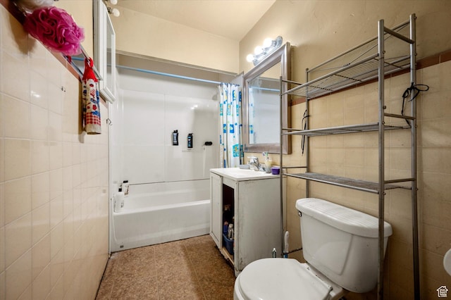 263 E Factory St, Garland, UT 84312 - full bath with vanity, shower / tub combo, tile walls, and tile patterned flooring