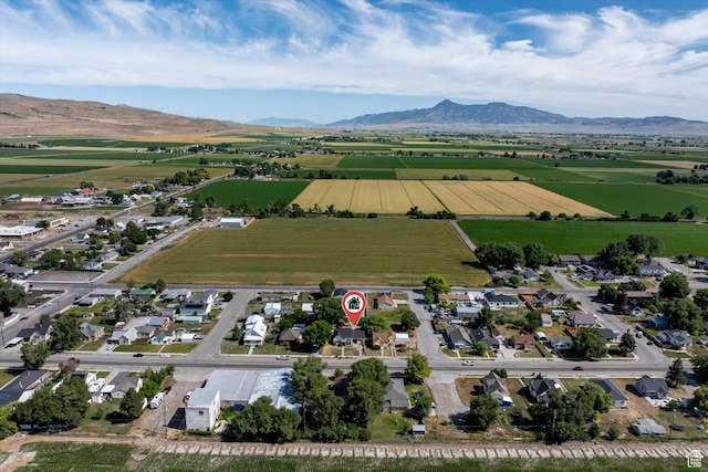 263 E Factory St, Garland, UT 84312 - aerial overview of property's location with a mountain backdrop and rural landscape