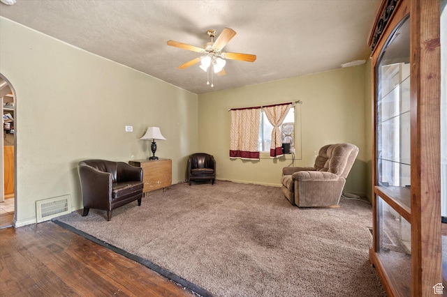 263 E Factory St, Garland, UT 84312 - sitting room with arched walkways and a ceiling fan