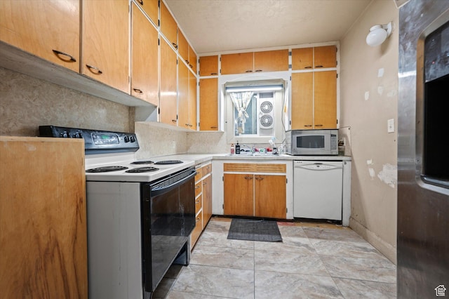 263 E Factory St, Garland, UT 84312 - kitchen with white appliances and light countertops