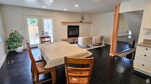 151 W 1485 N, Orem, UT 84057 - dining area with dark wood-style flooring, recessed lighting, french doors, and a glass covered fireplace