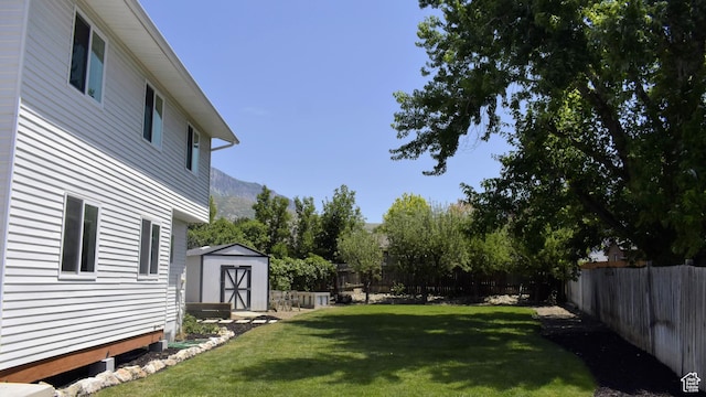 151 W 1485 N, Orem, UT 84057 - fenced backyard featuring a storage unit and a mountain view
