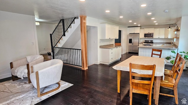 151 W 1485 N, Orem, UT 84057 - dining room featuring dark wood-style flooring, recessed lighting, and stairs